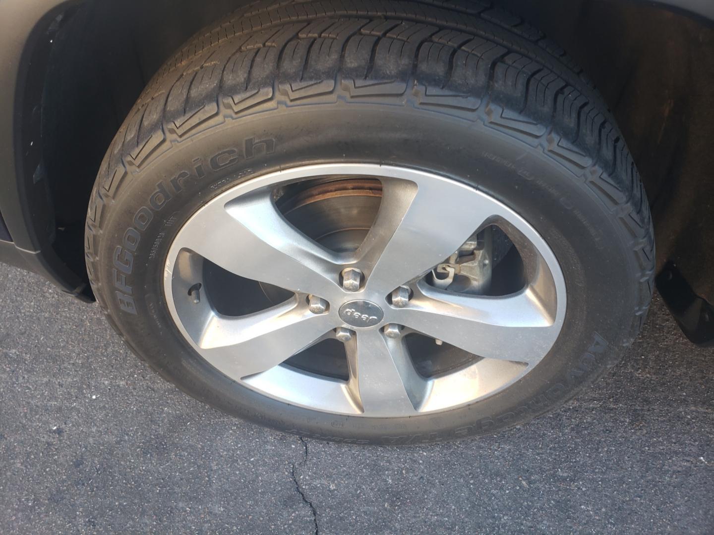 2014 /black Jeep Grand Cherokee laredo (1C4RJFAGXEC) with an 3.6L V6 DOHC 24V engine, 8 speed 4x4 transmission, located at 323 E Dunlap Ave., Phoenix, AZ, 85020, (602) 331-9000, 33.567677, -112.069000 - 2014 Jeep Grand Cherokee Laredo,......EXCELLENT condition,...... Ice Cold A/C front and rear, Clean Black interior with black cloth seats in near perfect condition, New brakes, Tune up, Touch scrren Stereo/CD player, satellite compatible, Phone sync, Bluetooth, This suv is gorgeous inside and out, I - Photo#18